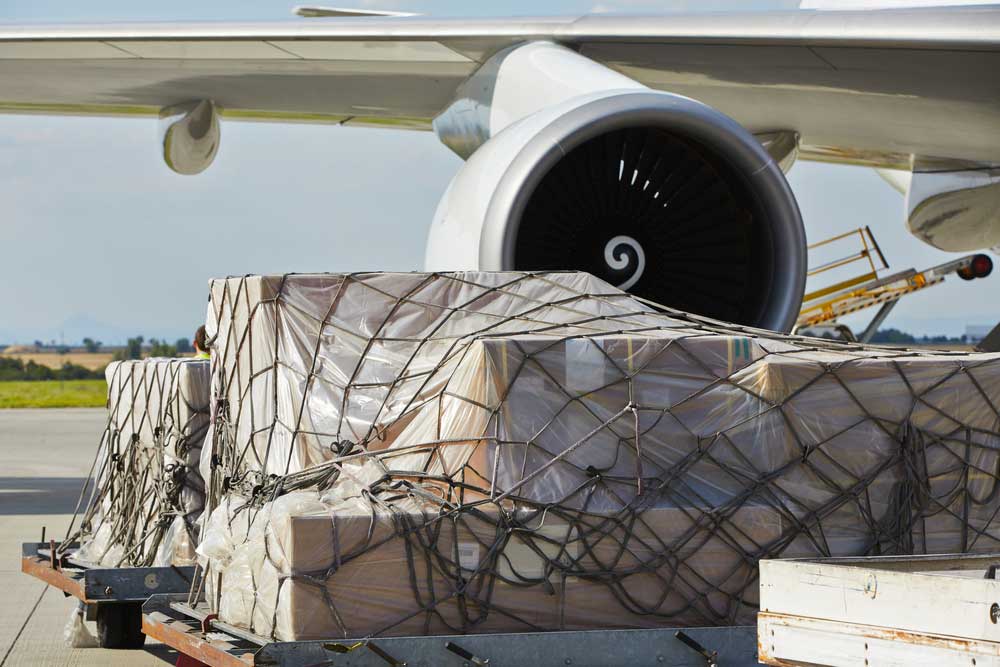 air freight ready to be loaded into the plane